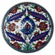 Plat en faïence ottomane Iznik Ceylan 30cm, décorée de motifs fleuris