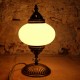 Lampe de salon originale en verre dépoli et laiton Cynia