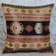 Coussin marron ethnique Bythinia aux motifs orientaux